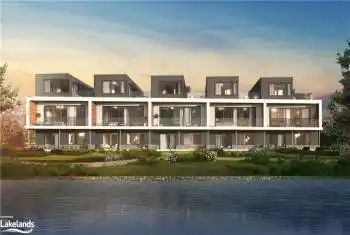 Back house at dusk with a water view